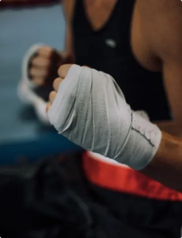 Hand with boxing hand wrap on it